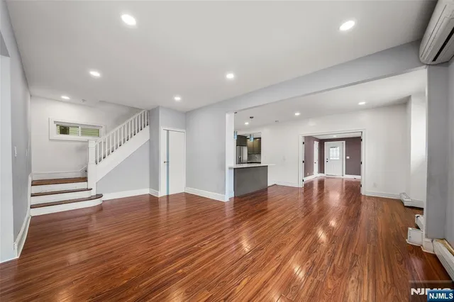 a view of kitchen and wooden floor