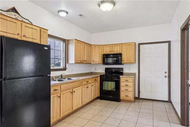 a bathroom with a bathtub and a sink