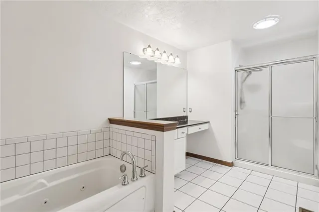 a bathroom with a sink double vanity and a mirror