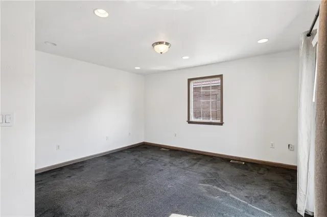 a workspace with furniture and window