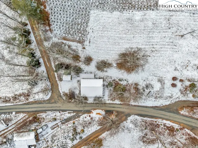 a view of a backyard of the house