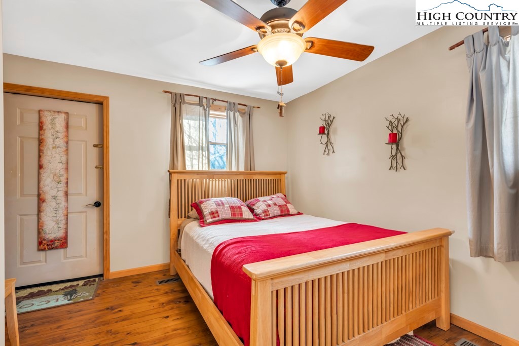 5171 Edgemont Road Collettsville, NC 28611 - Photo 10 of 21 a bedroom with a bed and a window