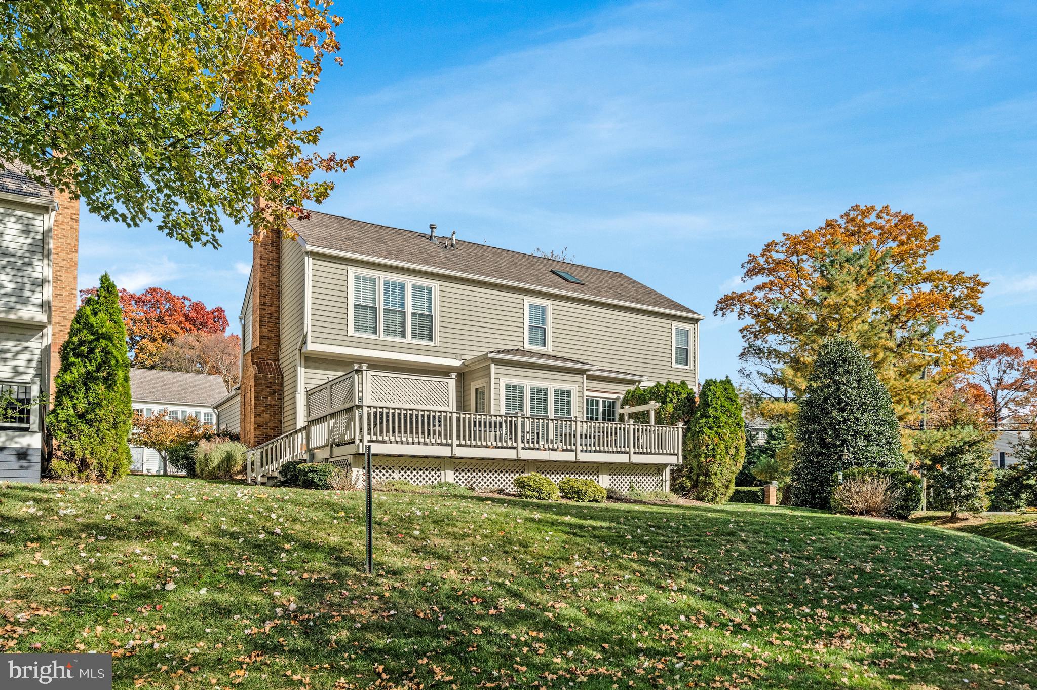 9733 Hidden Valley Road Vienna, VA 22181 - Photo 10 of 11 a view of a house with a yard