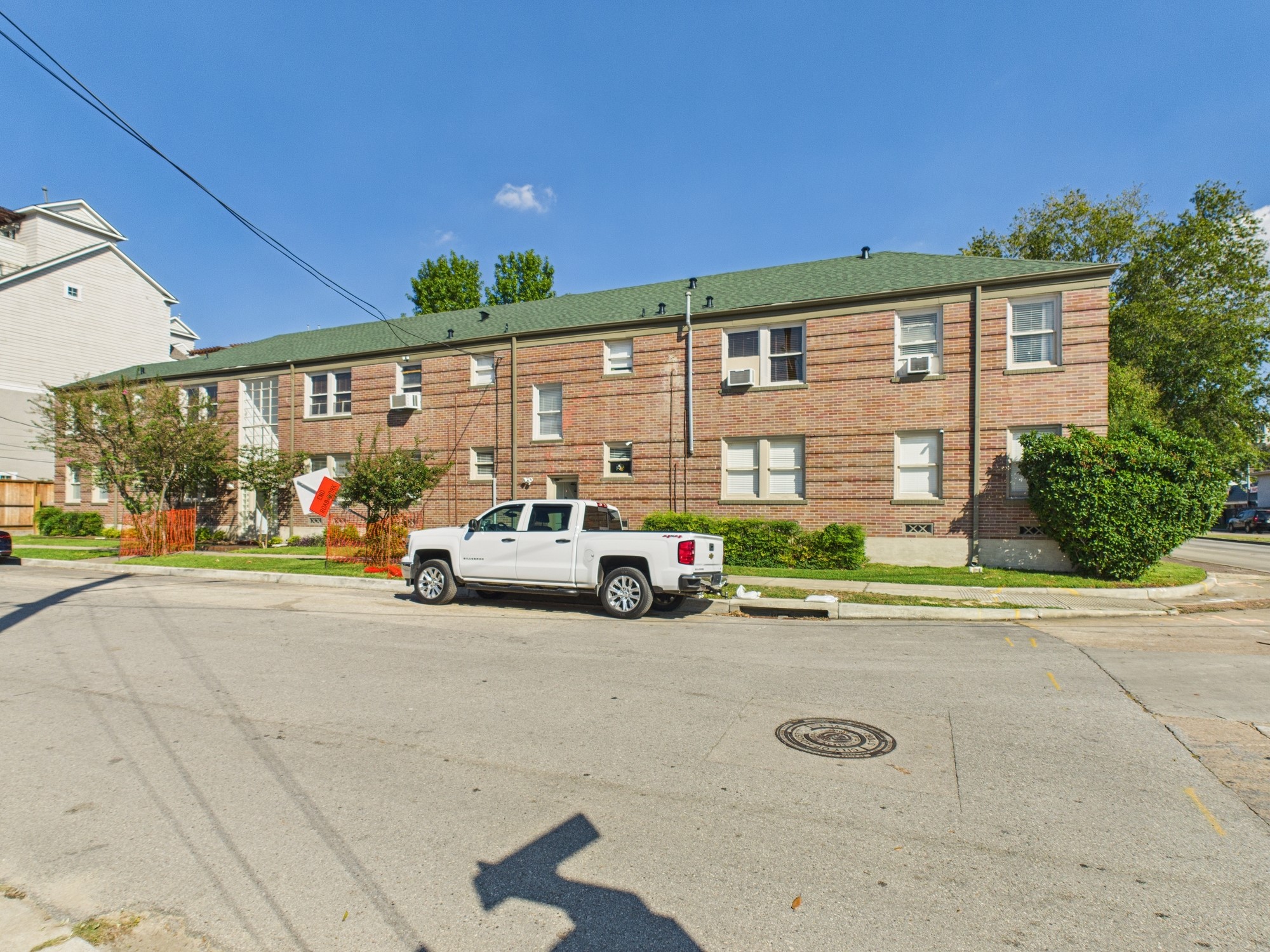 1920 Richmond Avenue, Unit 16 Houston, TX 77098 - Photo 17 of 18 a view of street with parked cars