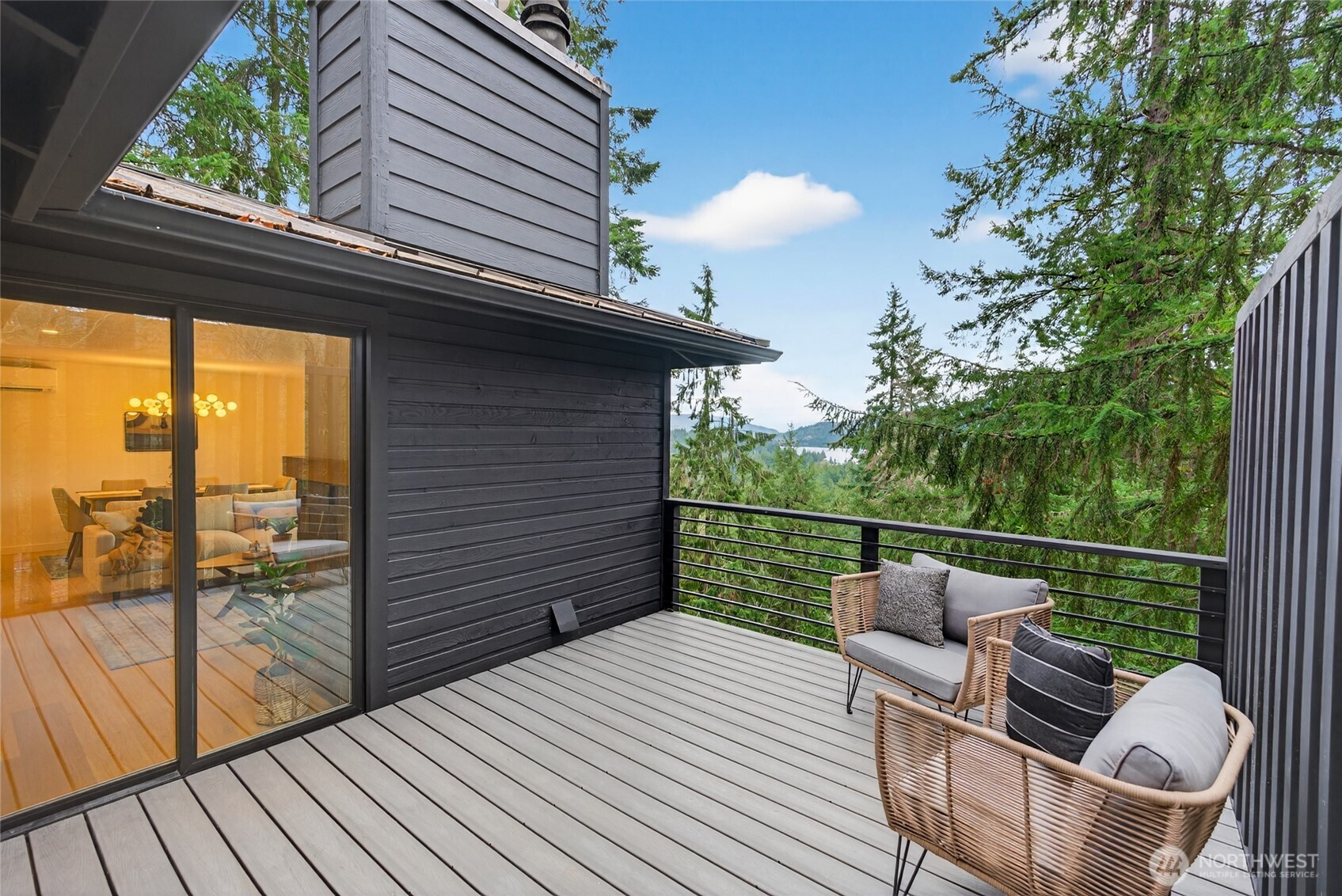 16 Southern Court Bellingham, WA 98229 - Photo 10 of 31 a view of a balcony with two chairs and a potted plant