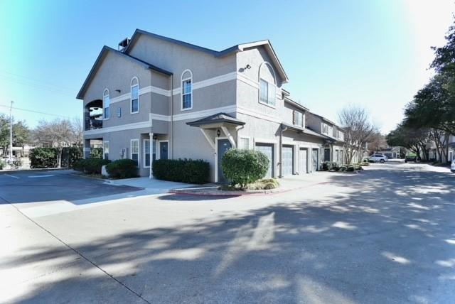 2601 Preston Road, Unit 6101 Plano, TX 75093 - Photo 1 of 1 a view of a white house with a street
