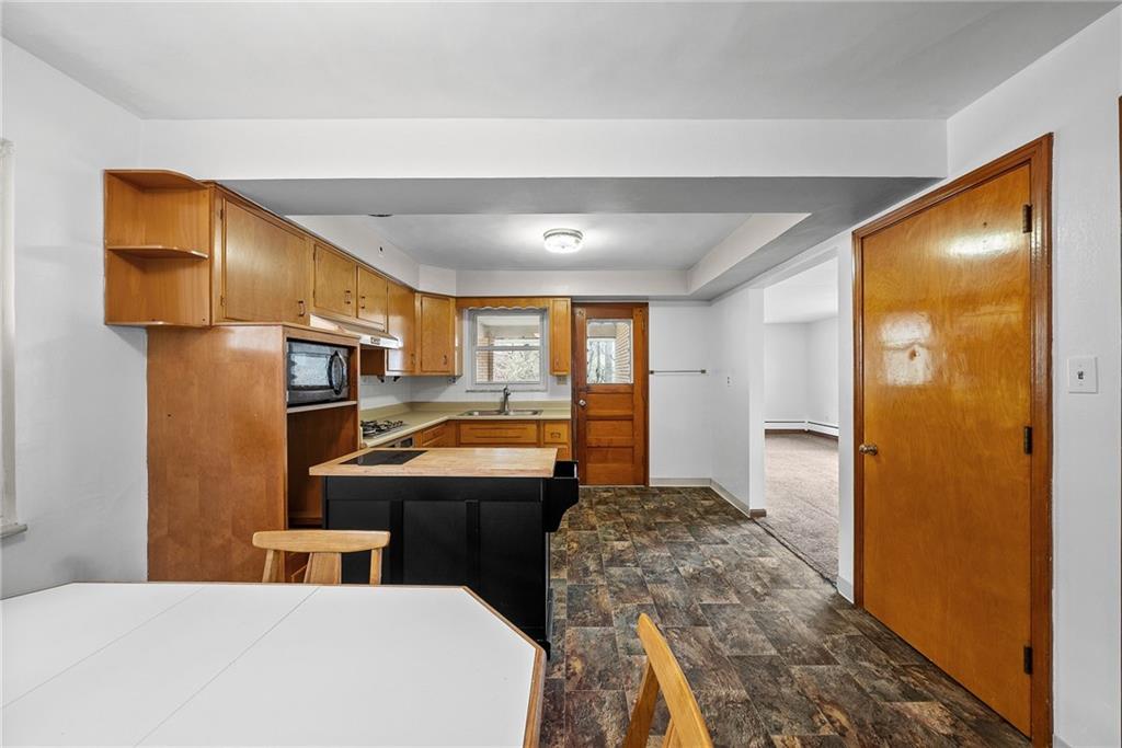 1353 Bower Hill Road Bridgeville, PA 15017 - Photo 12 of 45 Upper level dining area with brand new floors