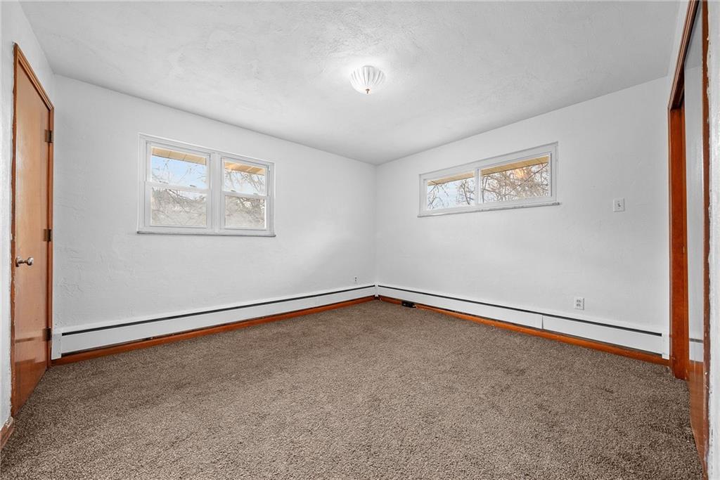 1353 Bower Hill Road Bridgeville, PA 15017 - Photo 14 of 45 Upper level bedroom. Hard woods under carpets. 2 closets. 1 with attic access.
