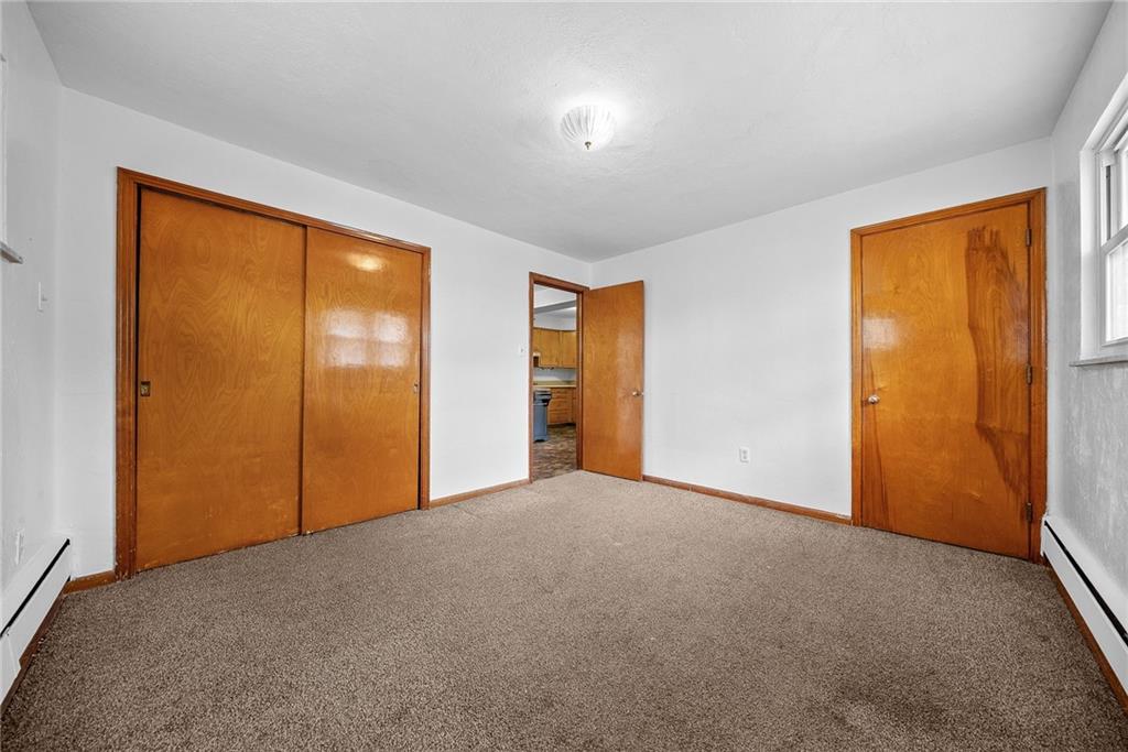 1353 Bower Hill Road Bridgeville, PA 15017 - Photo 15 of 45 Upper level bedroom. Hard woods under carpets. 2 closets. 1 with attic access.