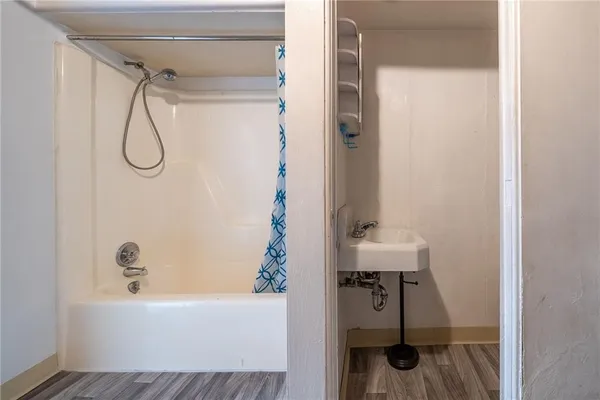 a view of a hallway with seating area