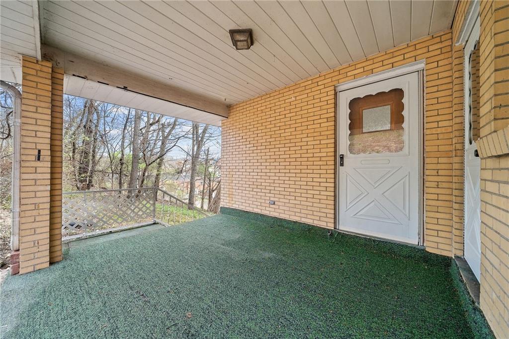 1353 Bower Hill Road Bridgeville, PA 15017 - Photo 34 of 45 Upper level covered patio and upper level entry.
