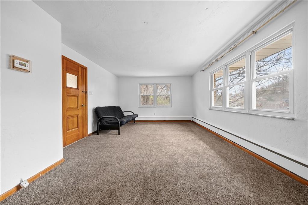 1353 Bower Hill Road Bridgeville, PA 15017 - Photo 4 of 45 Upper level family room could function as a bedroom. Hard woods under all carpets.