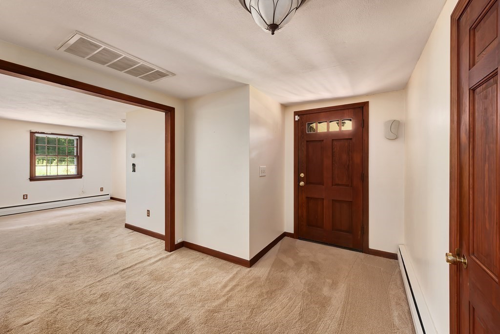 546 Ipswich Road Boxford, MA 01921 - Photo 8 of 27 an empty room with windows and closet