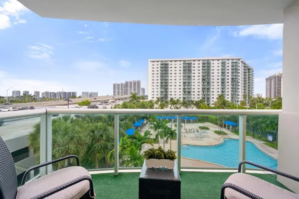 a view of a balcony with city view