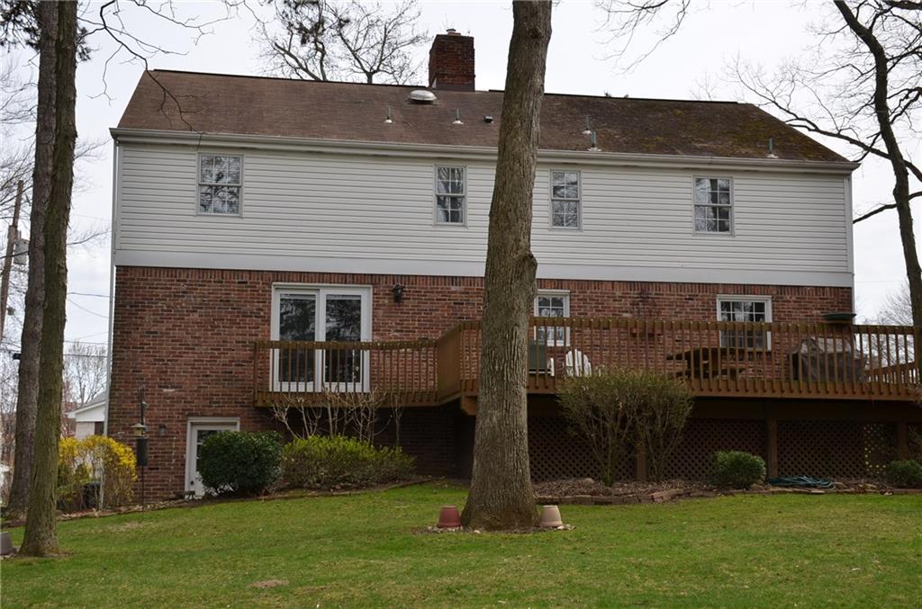 8187 Post Road Allison Park, PA 15101 - Photo 2 of 24 The rear view of the home from the expansive yard shows the patio doors leading from the family Room to the deck. There is also access to the deck from the kitchen.
