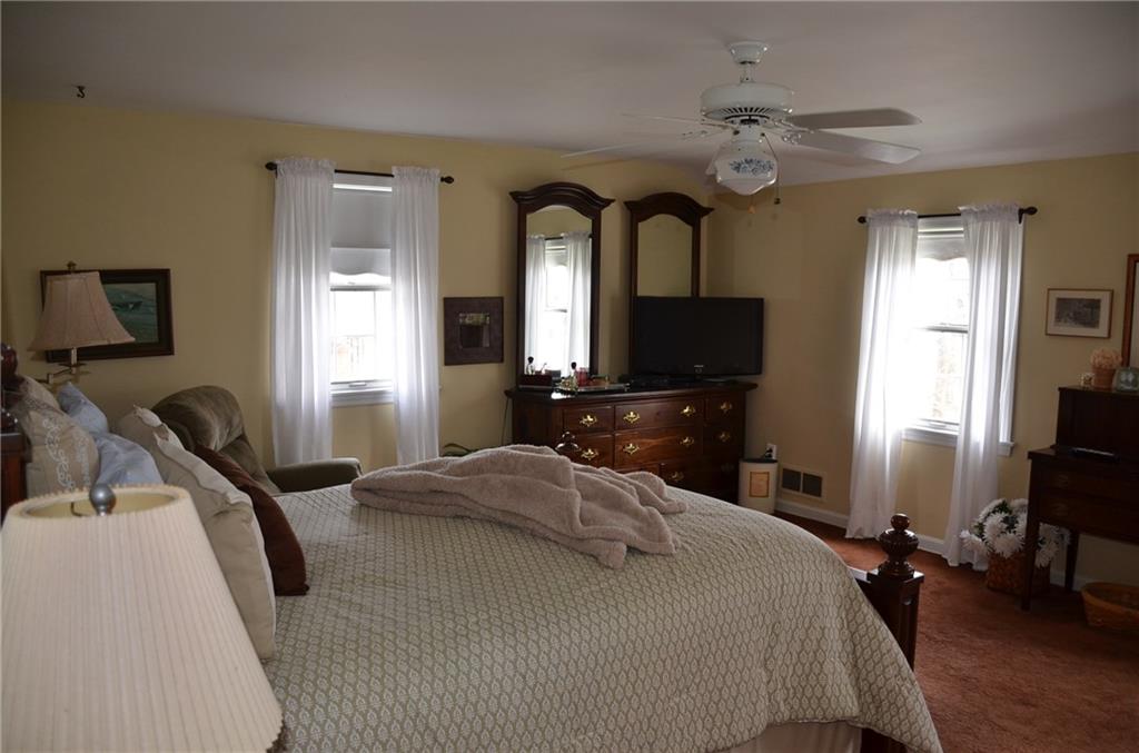 8187 Post Road Allison Park, PA 15101 - Photo 12 of 24 Other features of the Master Bedroom are the walk-in closet and the second large closet with organized wire shelving.
