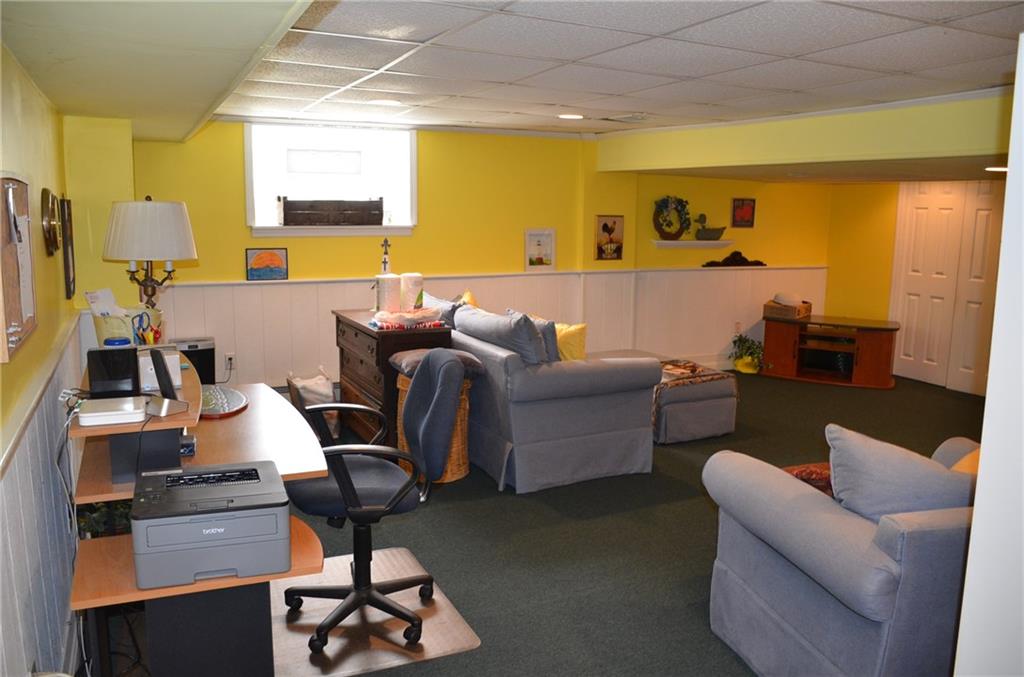 8187 Post Road Allison Park, PA 15101 - Photo 18 of 24 The lower level Game Room is carpeted and has plenty of storage and vented glass block windows.