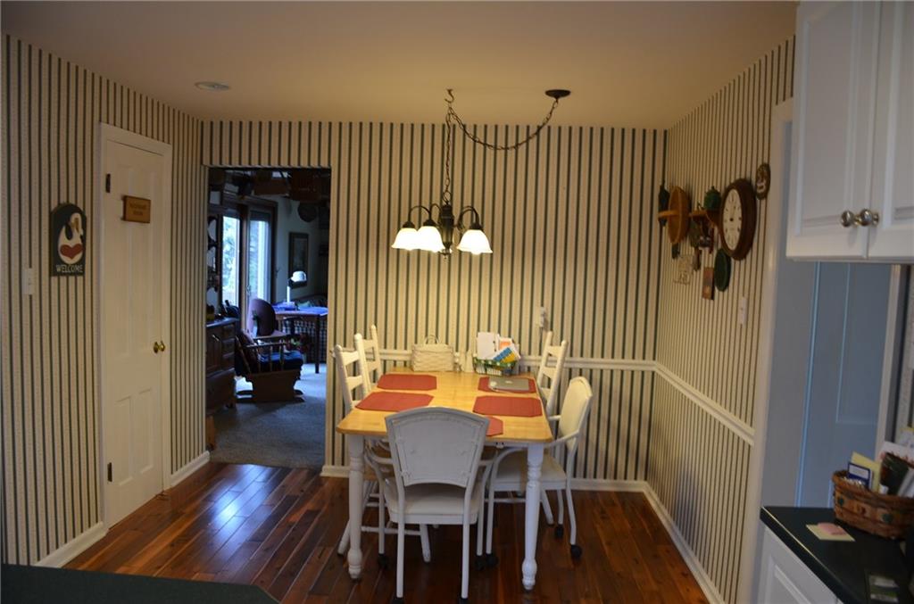 8187 Post Road Allison Park, PA 15101 - Photo 8 of 24 Other features of the eat-in kitchen include new hardwood floors and access to the deck.