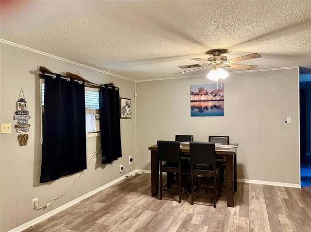 a view of a workspace with furniture