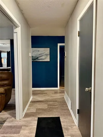 a view of a entryway door front of a house