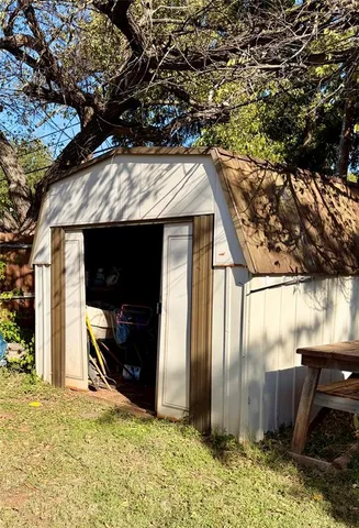 a house with trees in front of it