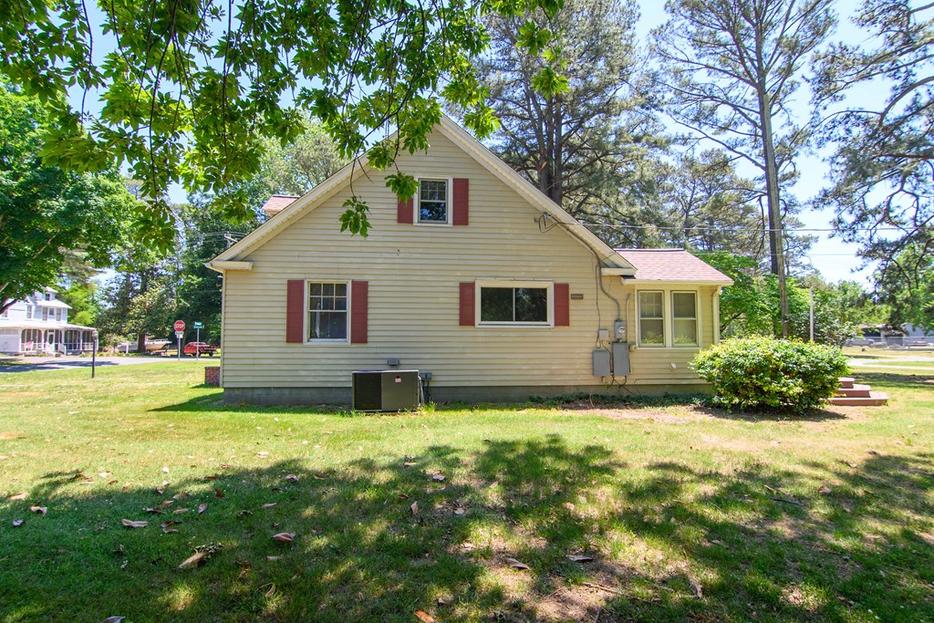 24432 Maxwell Street Parksley, VA 23421 - Photo 33 of 39 a view of a house with a yard