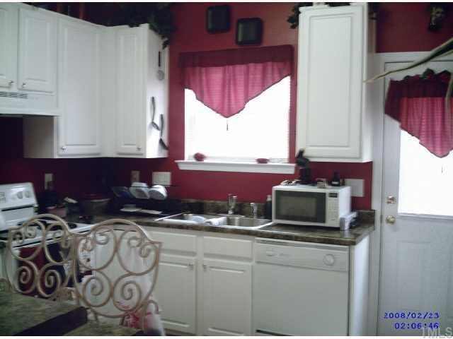 412 Burrell Road Durham, NC 27703 - Photo 6 of 6 With Counter , White Cabinet and Cooking Range Kitchen