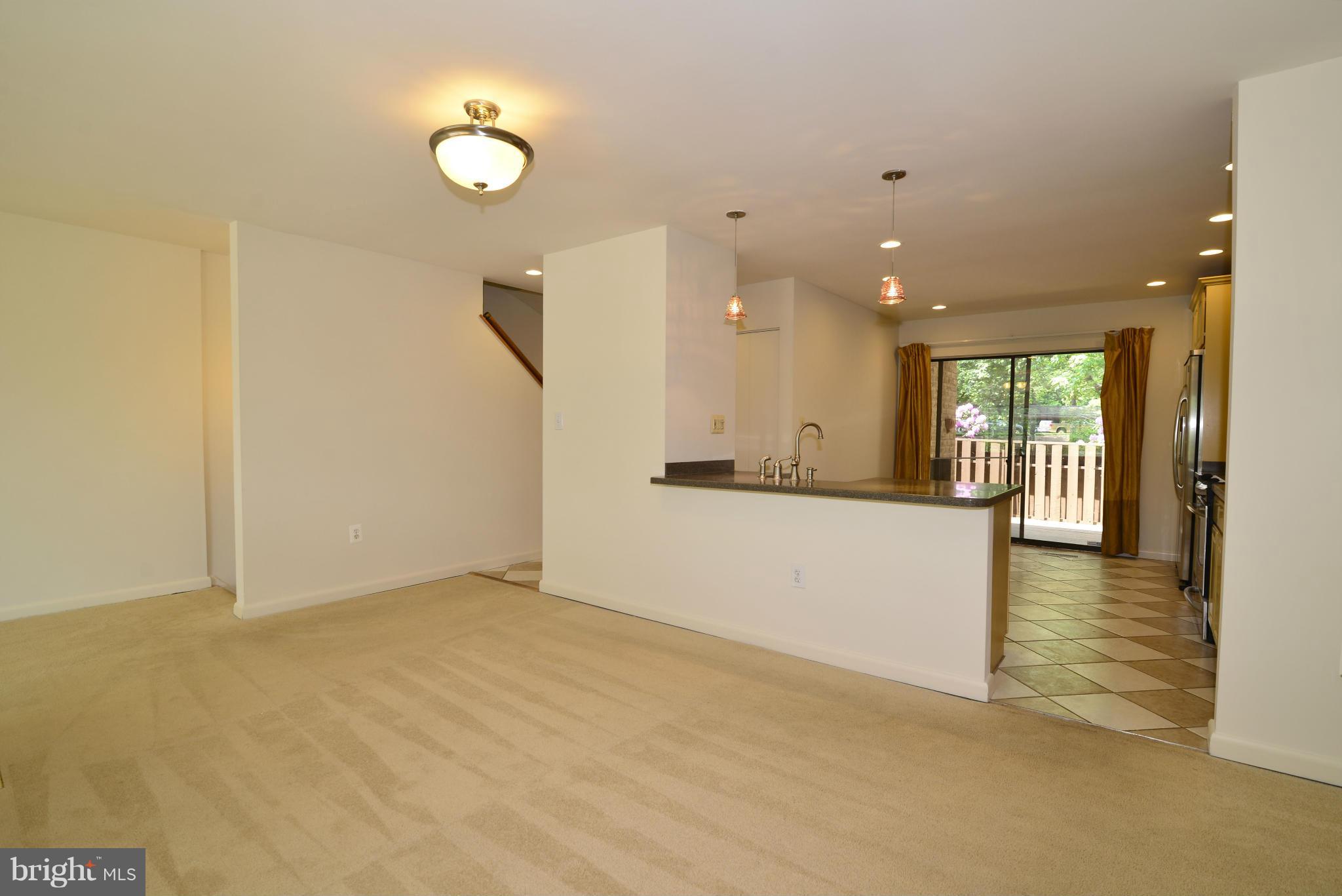 11212 Lagoon Lane Reston, VA 20191 - Photo 5 of 24 The dining room opens to the kitchen