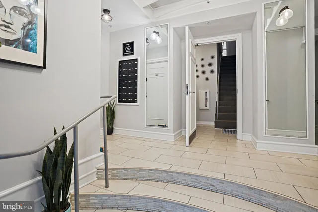 a view of front door with hallway