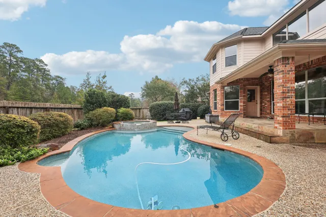 a view of a house with swimming pool
