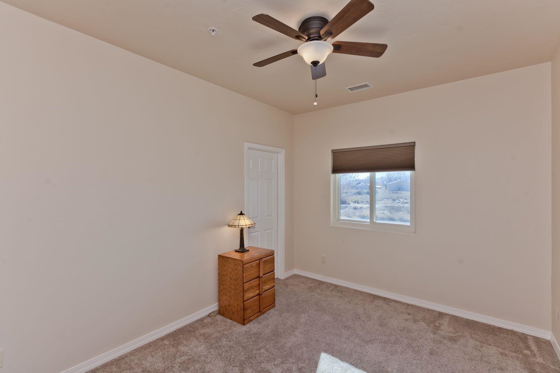 1353 19 Road Fruita, CO 81521 - Photo 34 of 42 en empty room with windows