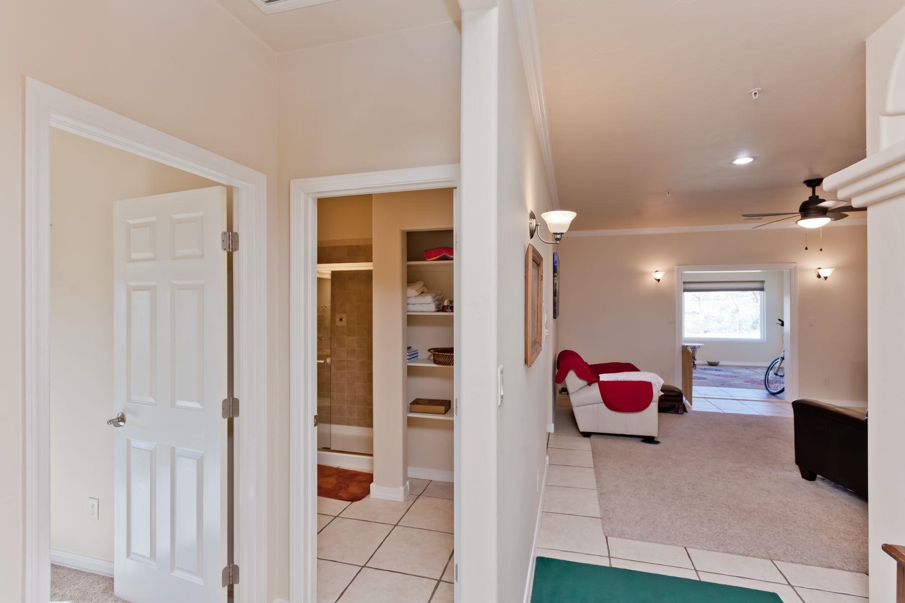 1353 19 Road Fruita, CO 81521 - Photo 4 of 42 a view of a bedroom with wooden floor and windows