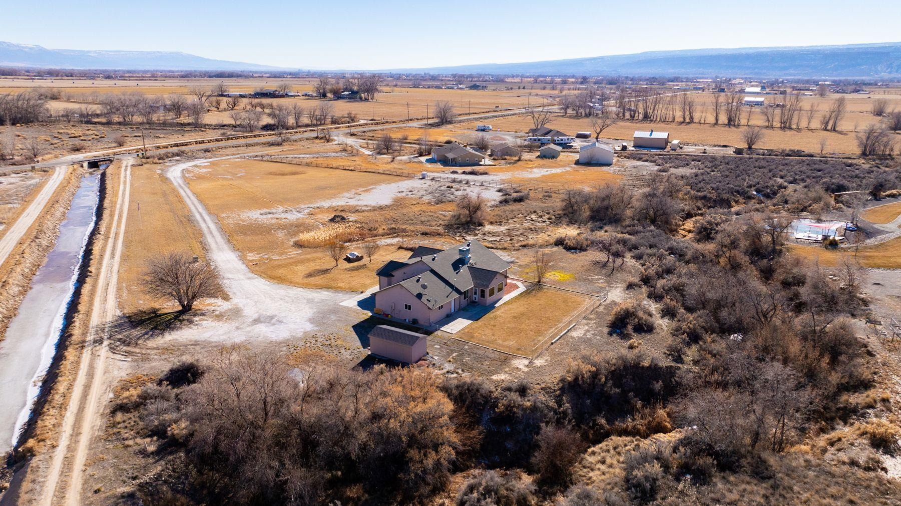1353 19 Road Fruita, CO 81521 - Photo 42 of 42 an aerial view of residential houses with outdoor space