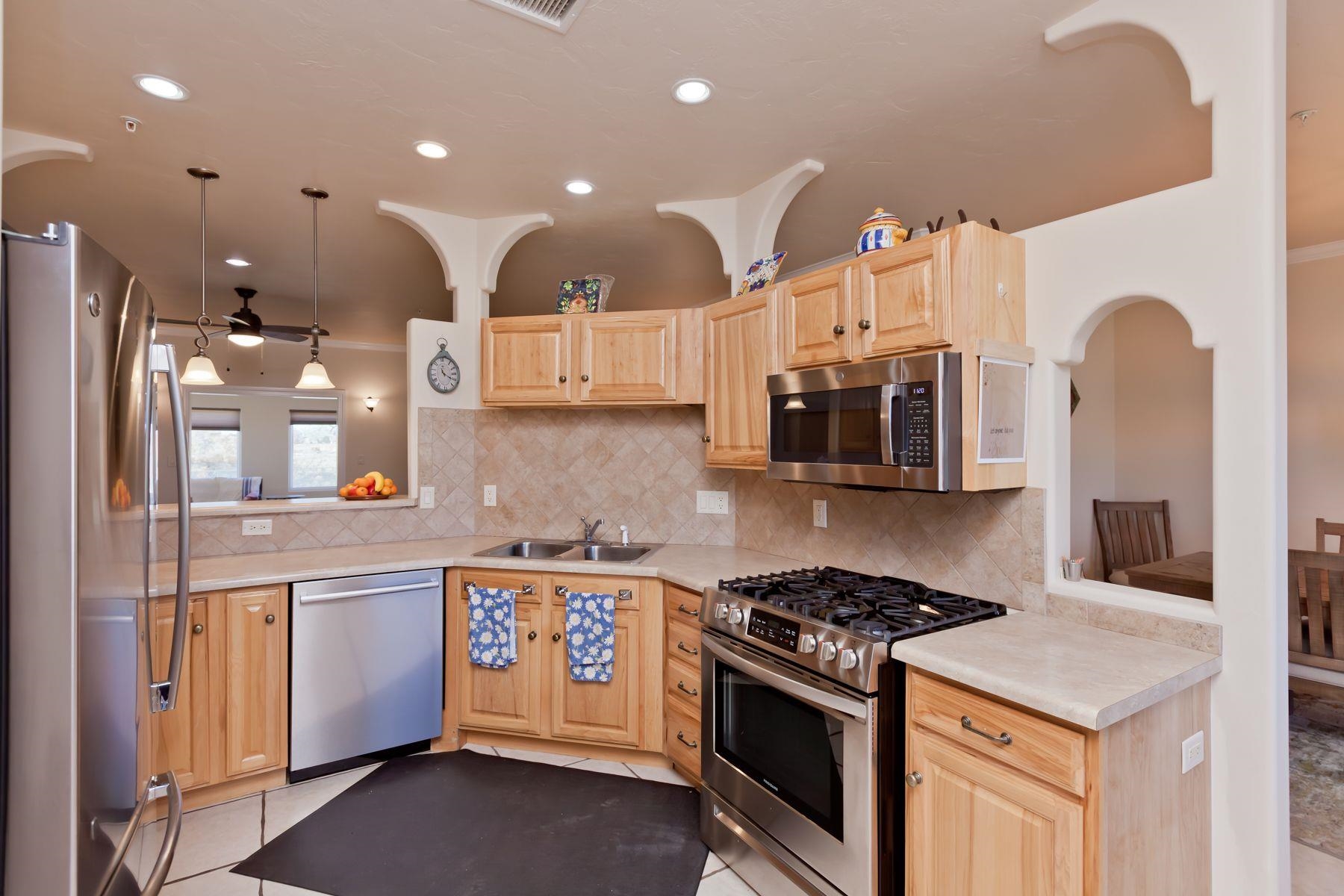 1353 19 Road Fruita, CO 81521 - Photo 5 of 42 a kitchen with a stove and a sink