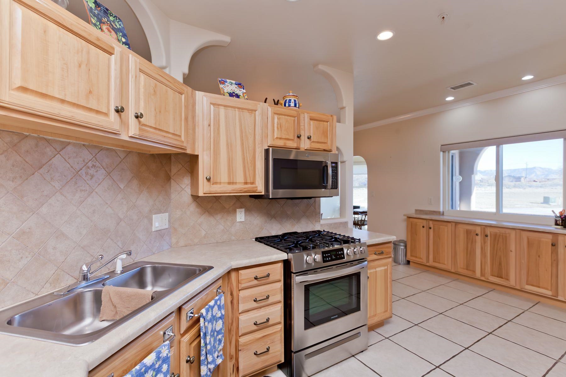 1353 19 Road Fruita, CO 81521 - Photo 6 of 42 a kitchen that has a sink and a stove