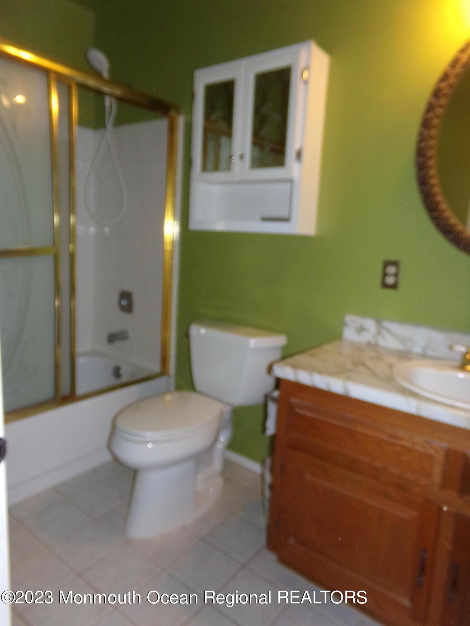 11 Ardmore Street, Unit 61 Whiting, NJ 08759 - Photo 12 of 34 a bathroom with a sink a toilet and shower