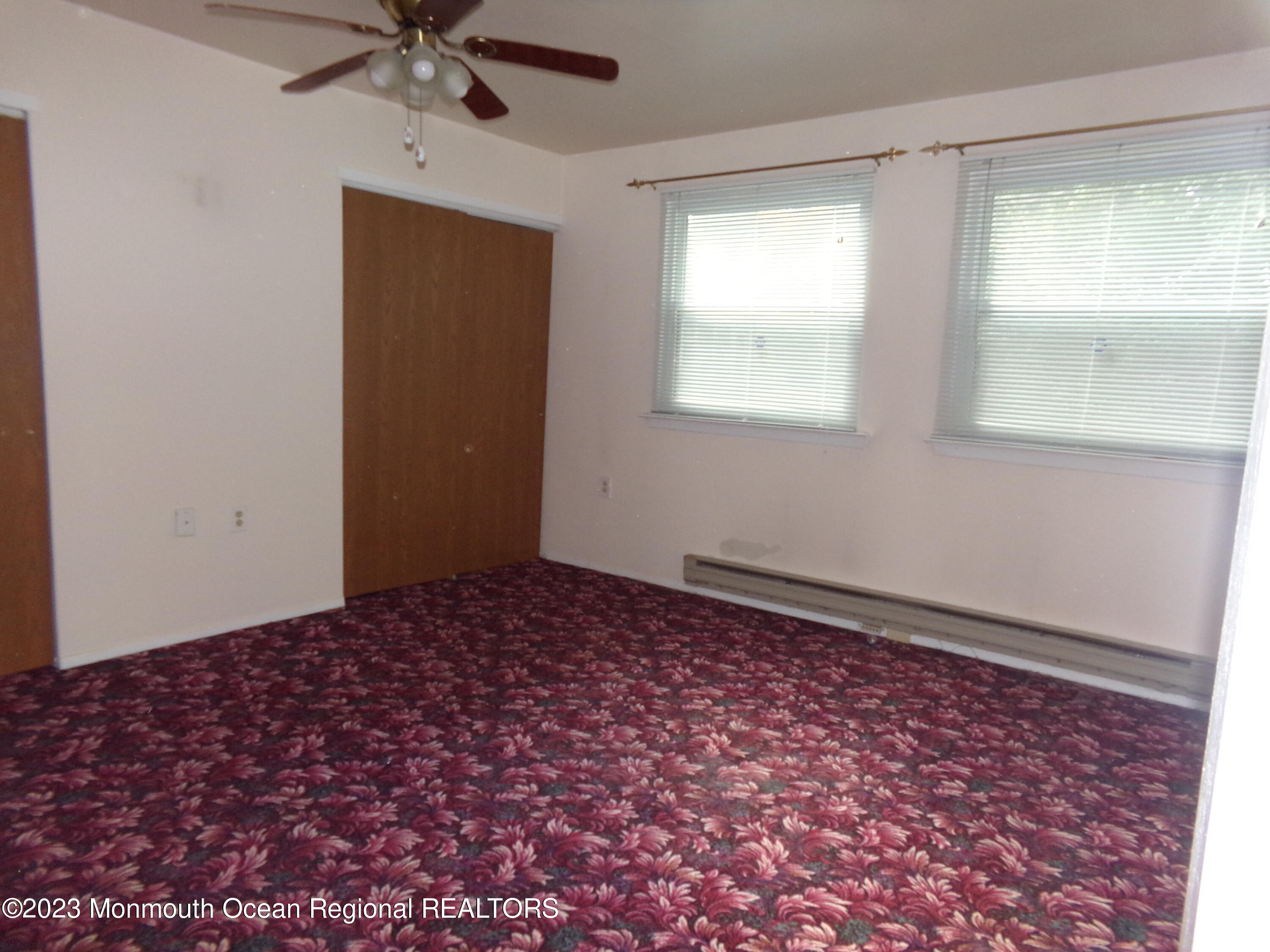 11 Ardmore Street, Unit 61 Whiting, NJ 08759 - Photo 13 of 34 a view of a big room with wooden floor and windows