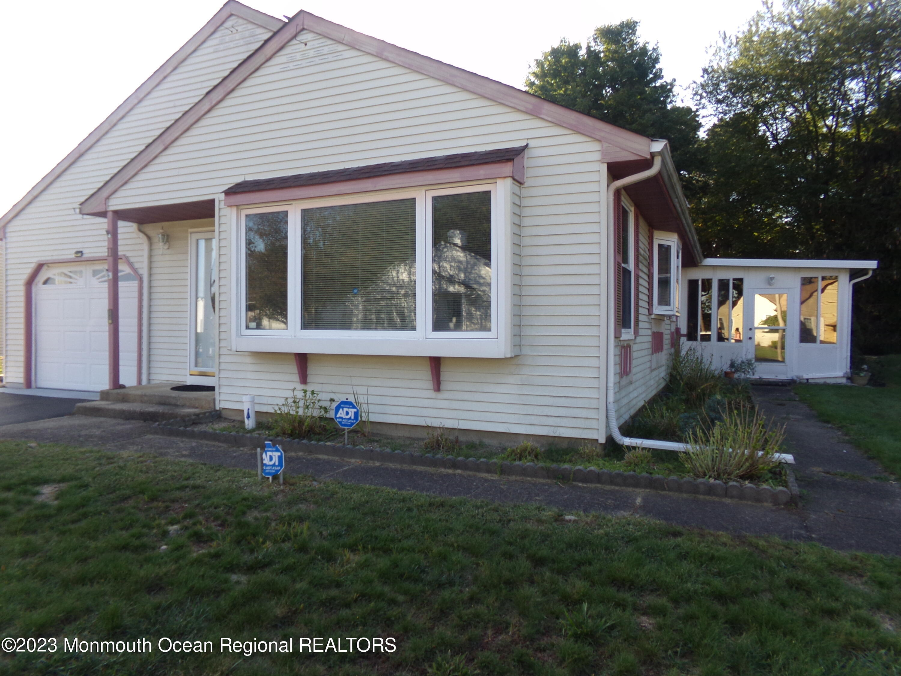 11 Ardmore Street, Unit 61 Whiting, NJ 08759 - Photo 2 of 34 a front view of house with a garden