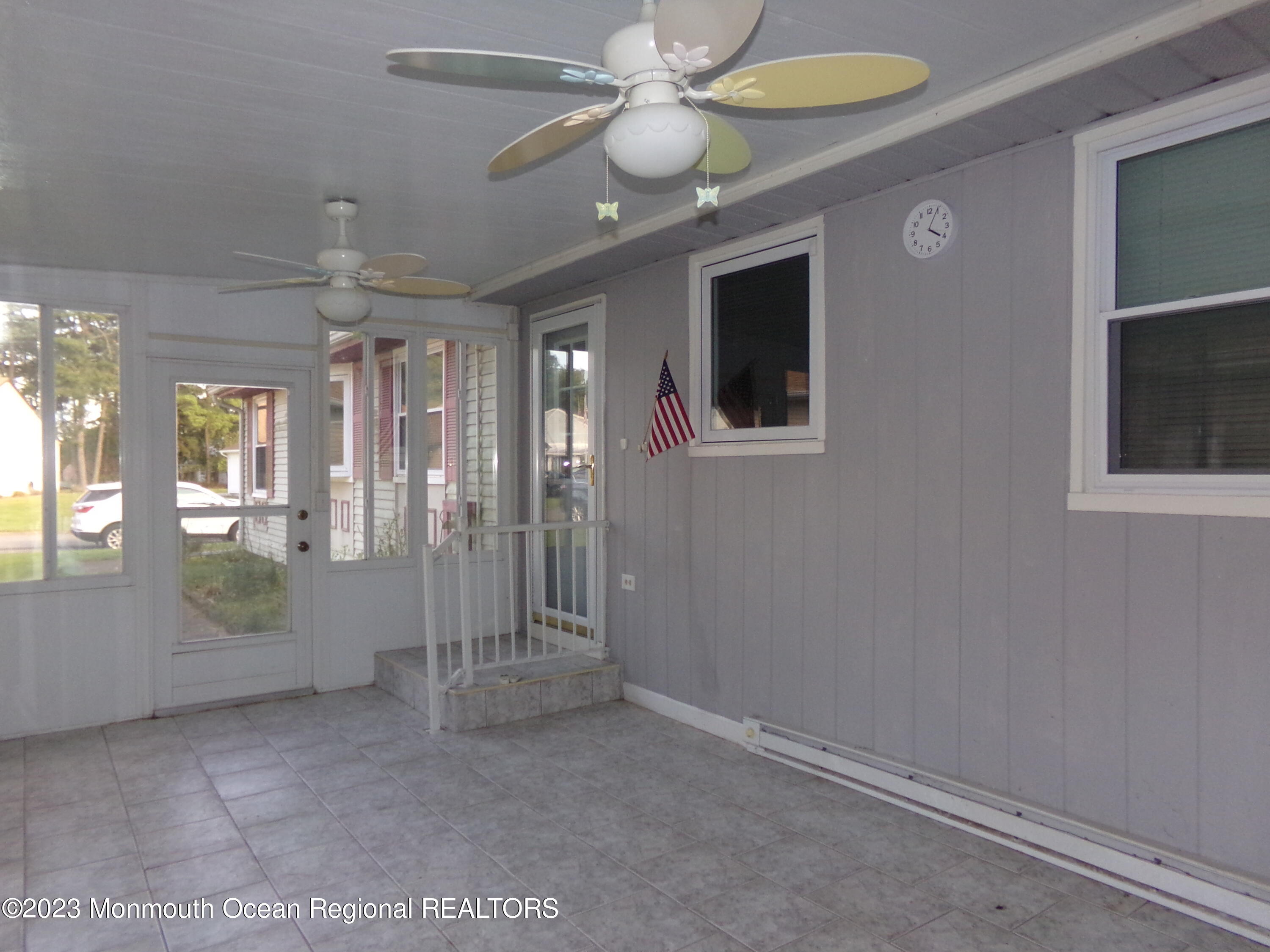 11 Ardmore Street, Unit 61 Whiting, NJ 08759 - Photo 23 of 34 en empty room with fan and windows