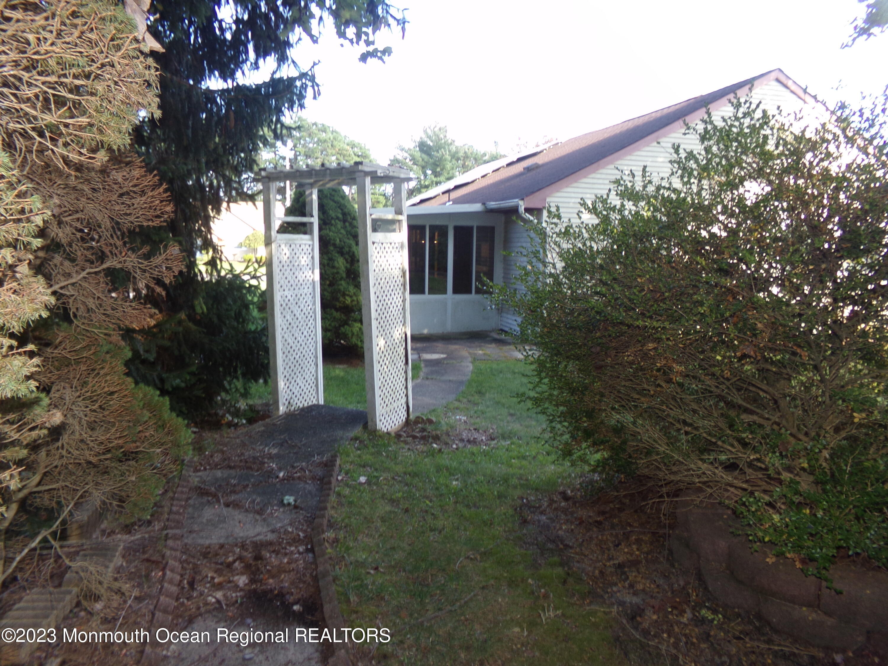 11 Ardmore Street, Unit 61 Whiting, NJ 08759 - Photo 29 of 34 a view of a house with a yard
