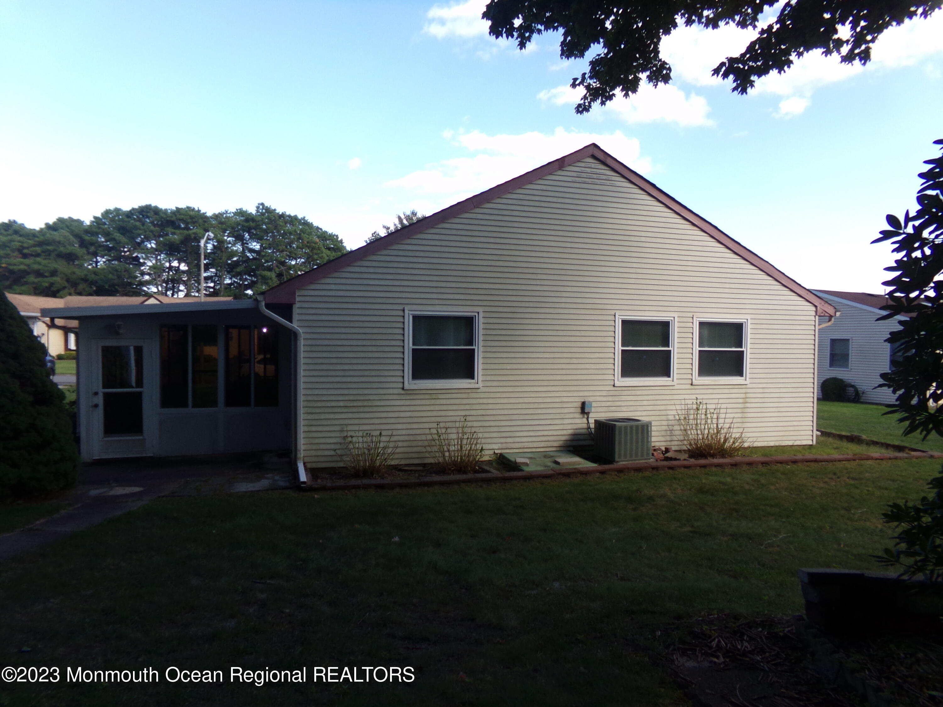 11 Ardmore Street, Unit 61 Whiting, NJ 08759 - Photo 3 of 34 a house view with a garden space