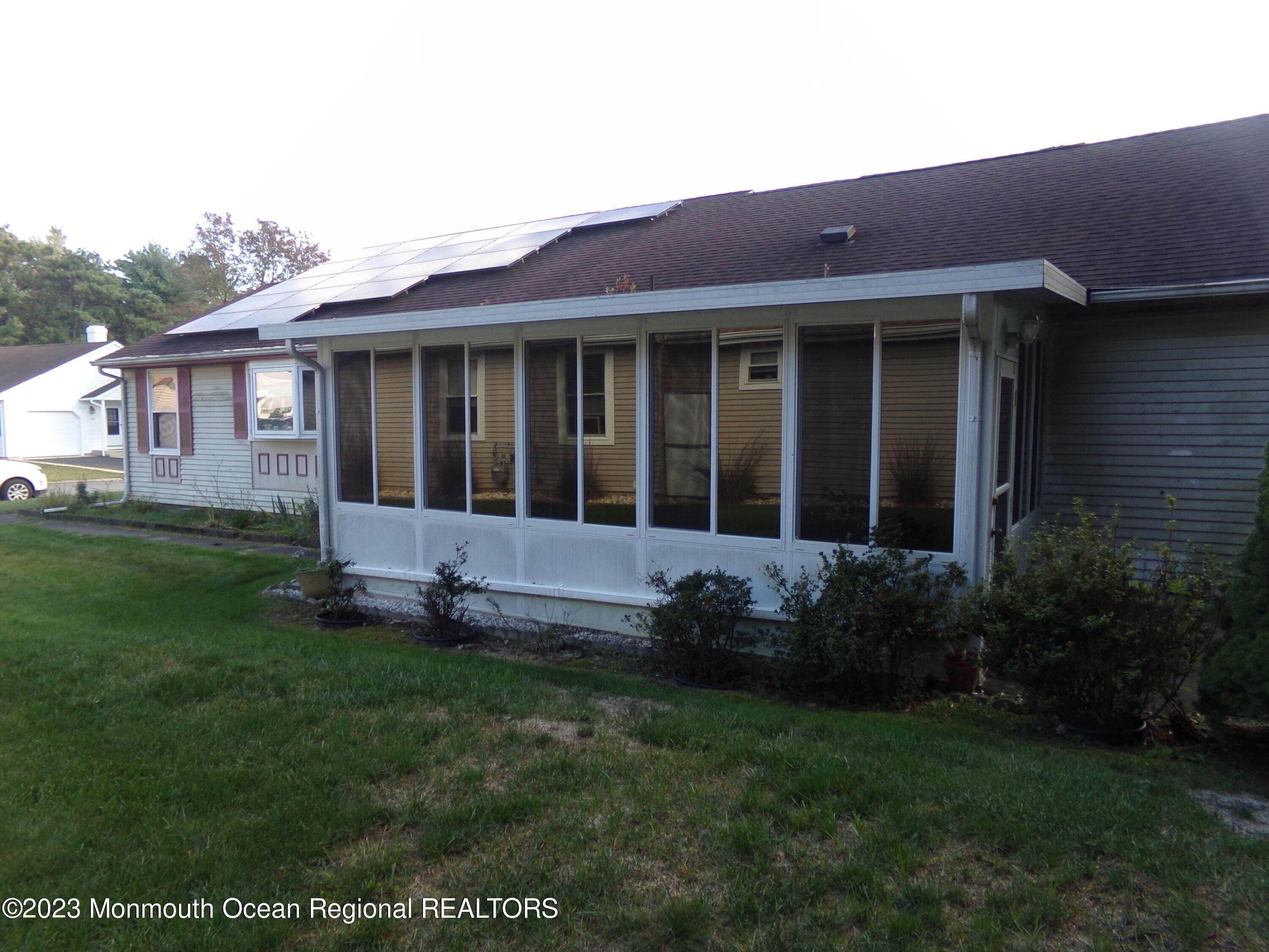 11 Ardmore Street, Unit 61 Whiting, NJ 08759 - Photo 33 of 34 a view of house with yard and front view of a house