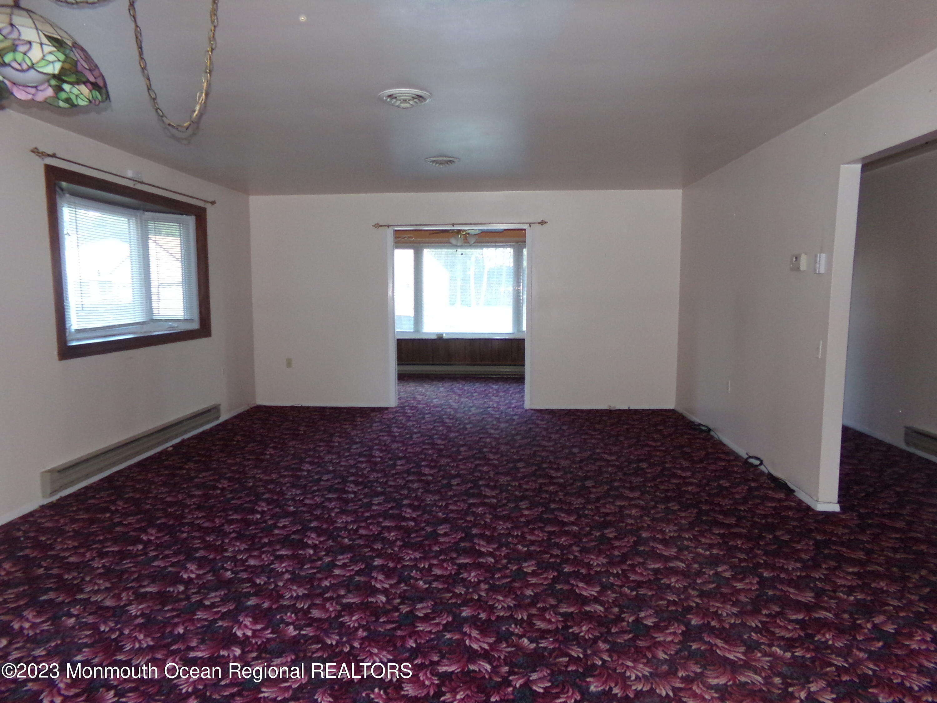 11 Ardmore Street, Unit 61 Whiting, NJ 08759 - Photo 6 of 34 a view of empty room with window