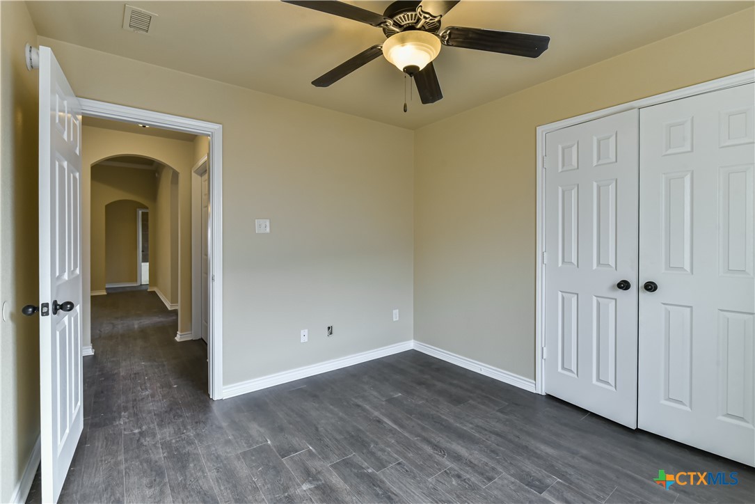 6905 Deorsam Loop Killeen, TX 76542 - Photo 16 of 21 wooden floor in an empty room