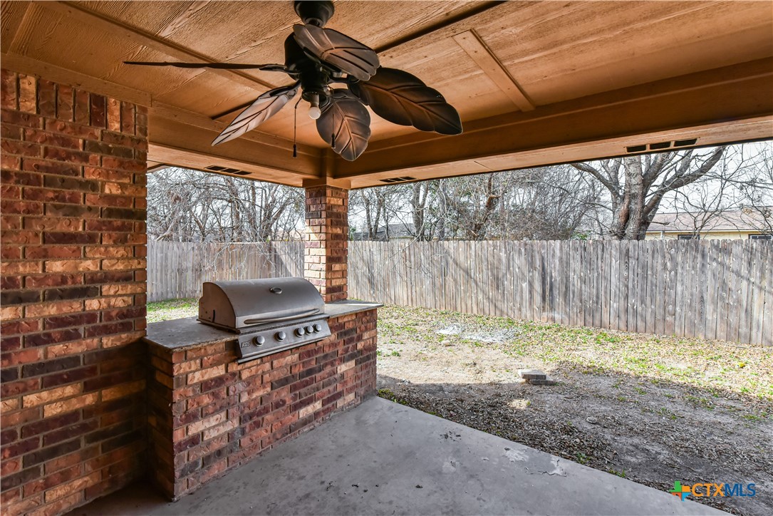 6905 Deorsam Loop Killeen, TX 76542 - Photo 20 of 21 a view of a backyard with a sink