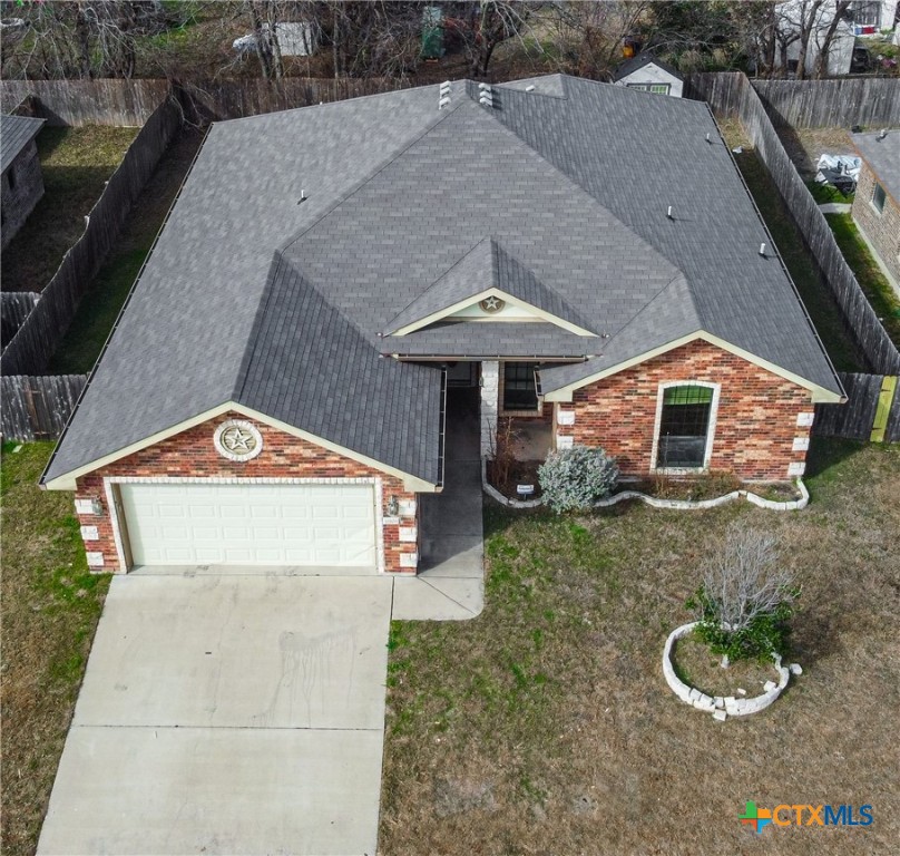 6905 Deorsam Loop Killeen, TX 76542 - Photo 21 of 21 a front view of a house with a yard