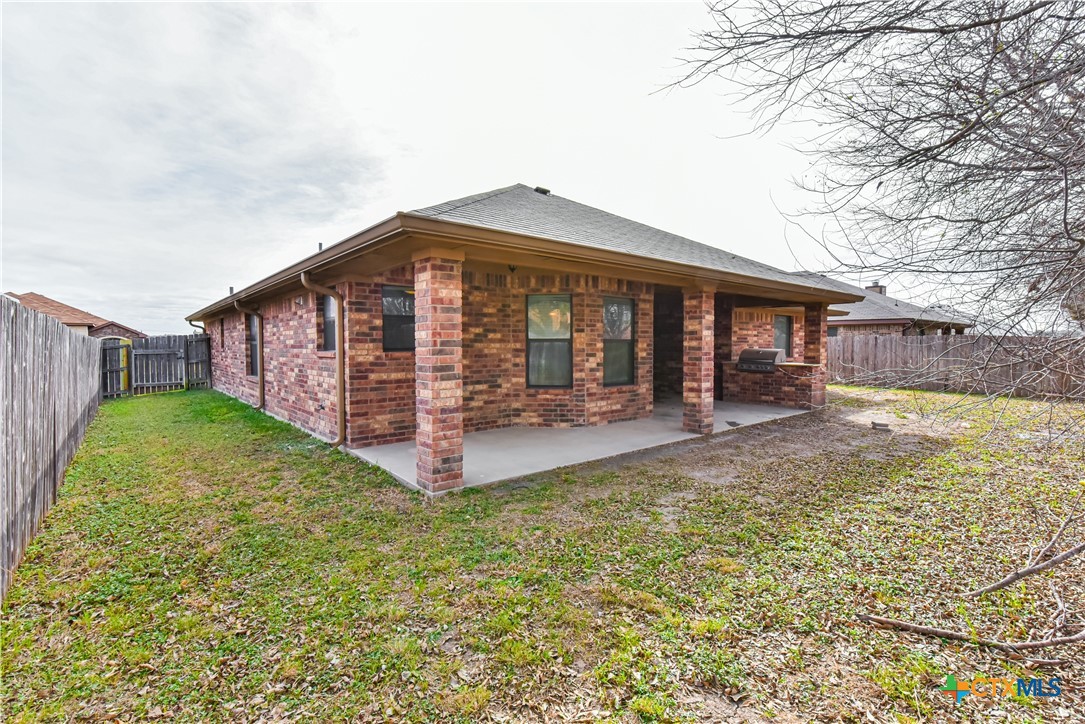 6905 Deorsam Loop Killeen, TX 76542 - Photo 4 of 21 a view of a house with a yard and sitting area