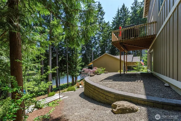 a backyard of a house with lots of green space