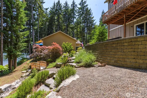 an aerial view of a house with outdoor space