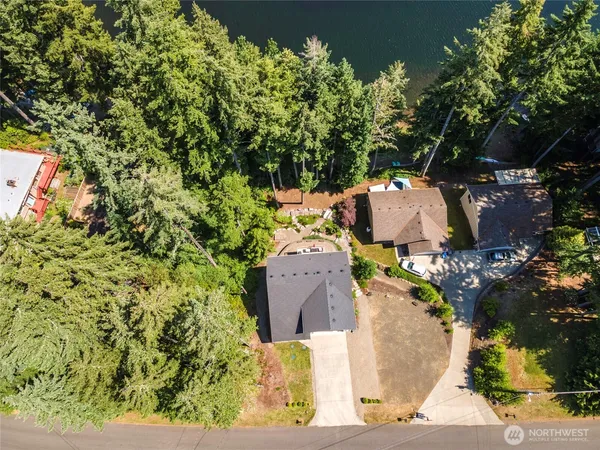 a view of a lake with a yard